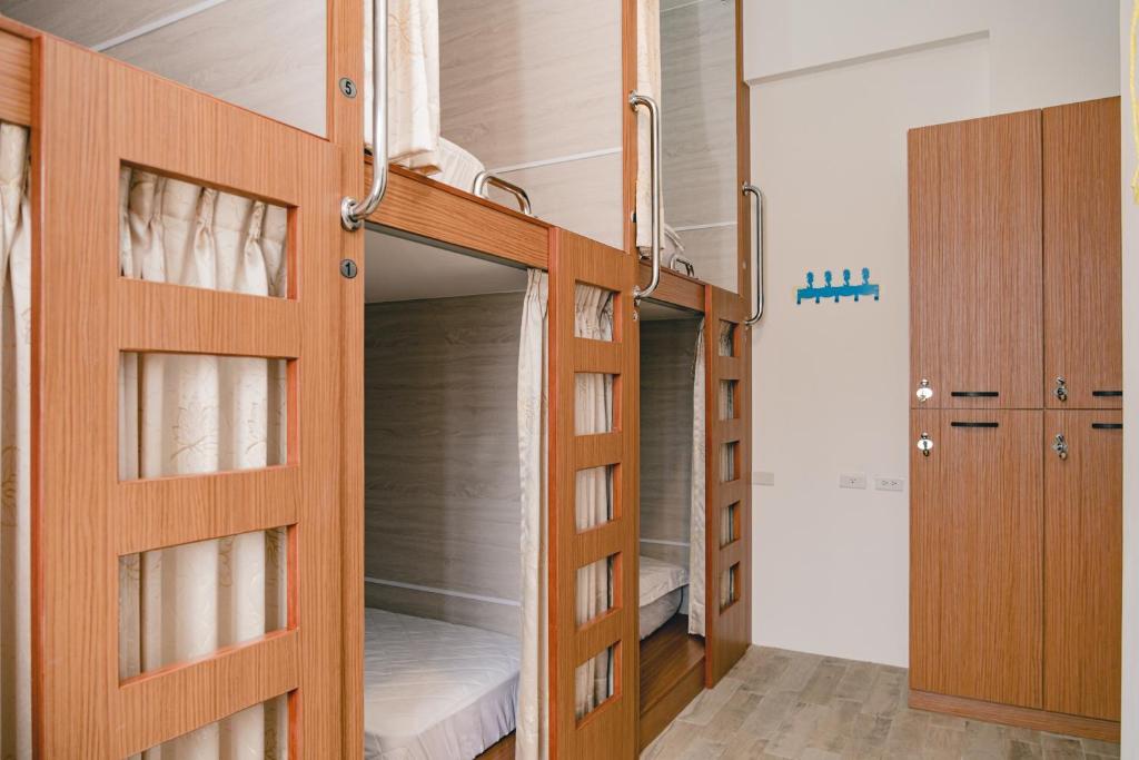 Postel nebo postele na pokoji v ubytování Destination Inn