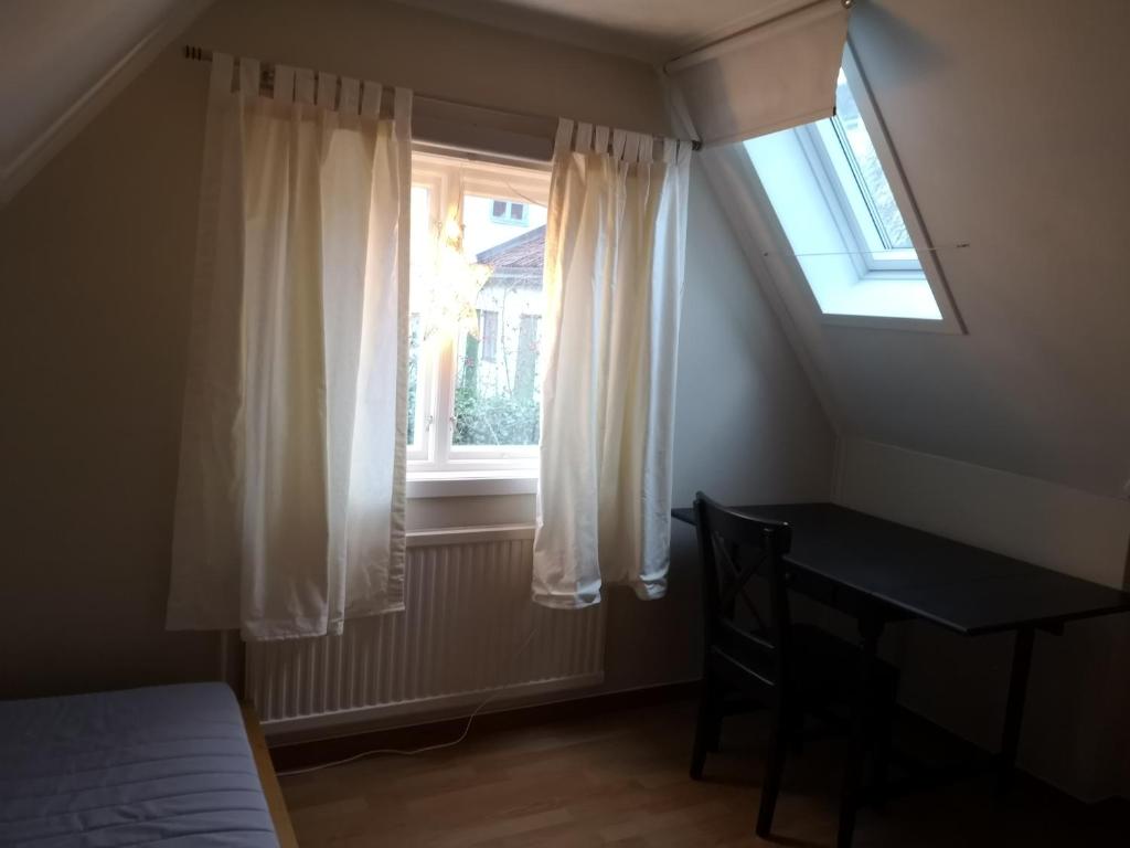 Postel nebo postele na pokoji v ubytování Wisby Trossen 4 AB