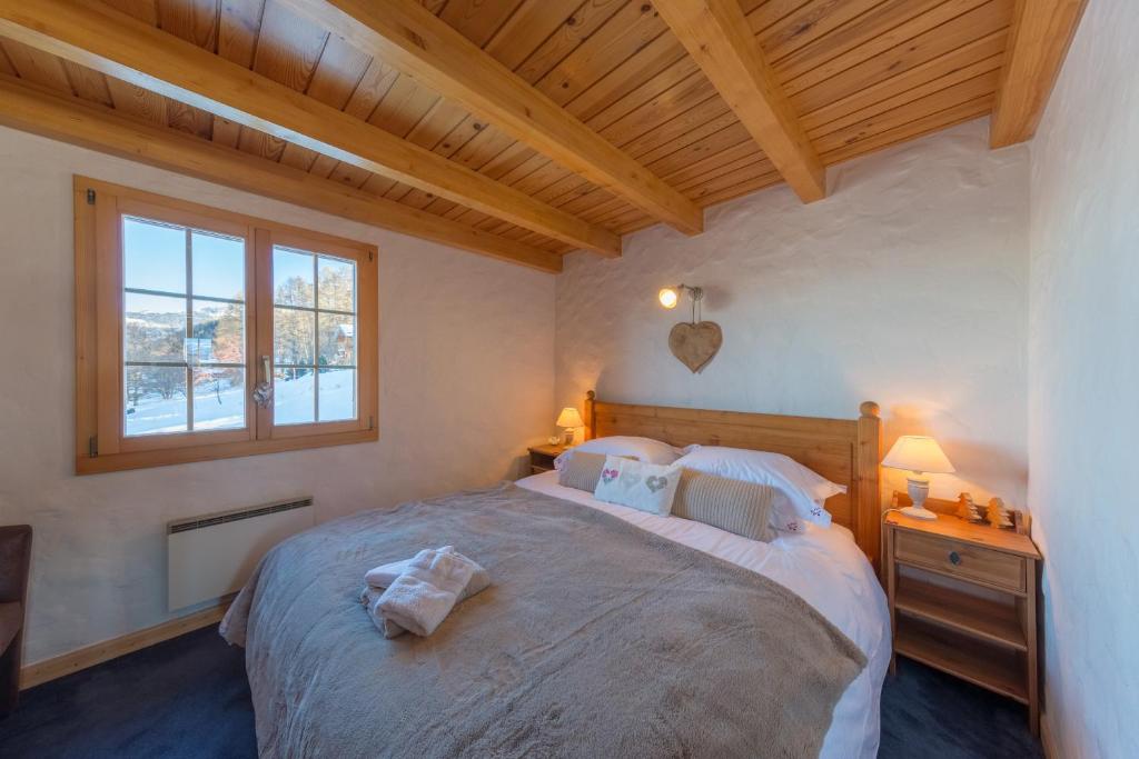 Postel nebo postele na pokoji v ubytování Chalet Pierre Blanche