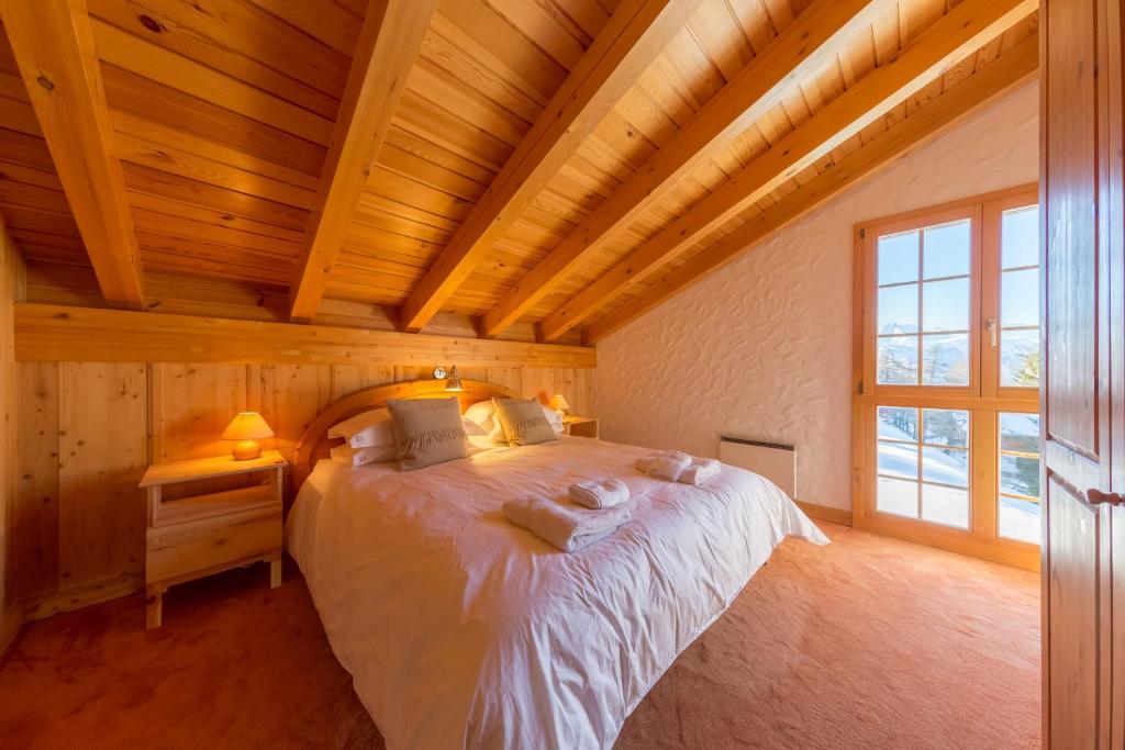 Postel nebo postele na pokoji v ubytování Chalet Pierre Blanche