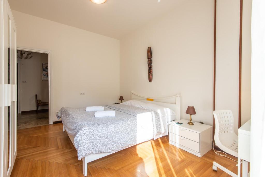 Postel nebo postele na pokoji v ubytování Milano Guest House
