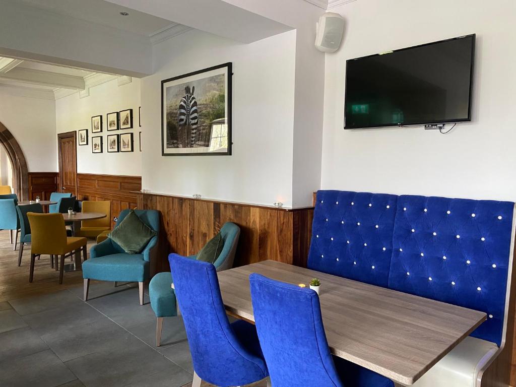 TV a/nebo společenská místnost v ubytování The Craigie Hotel