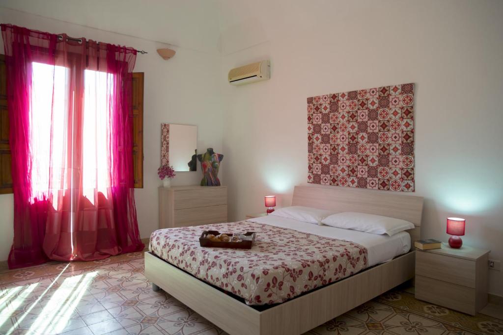 Krevet ili kreveti u jedinici u objektu Appartamento Savoia 46