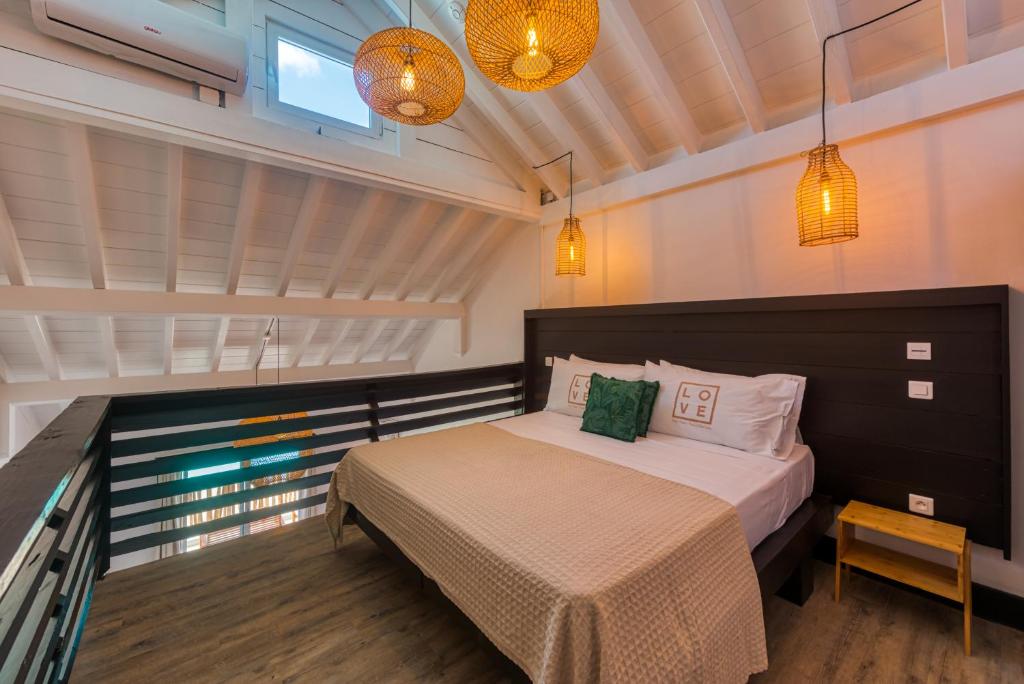 Postel nebo postele na pokoji v ubytování Love Boutique Hotel