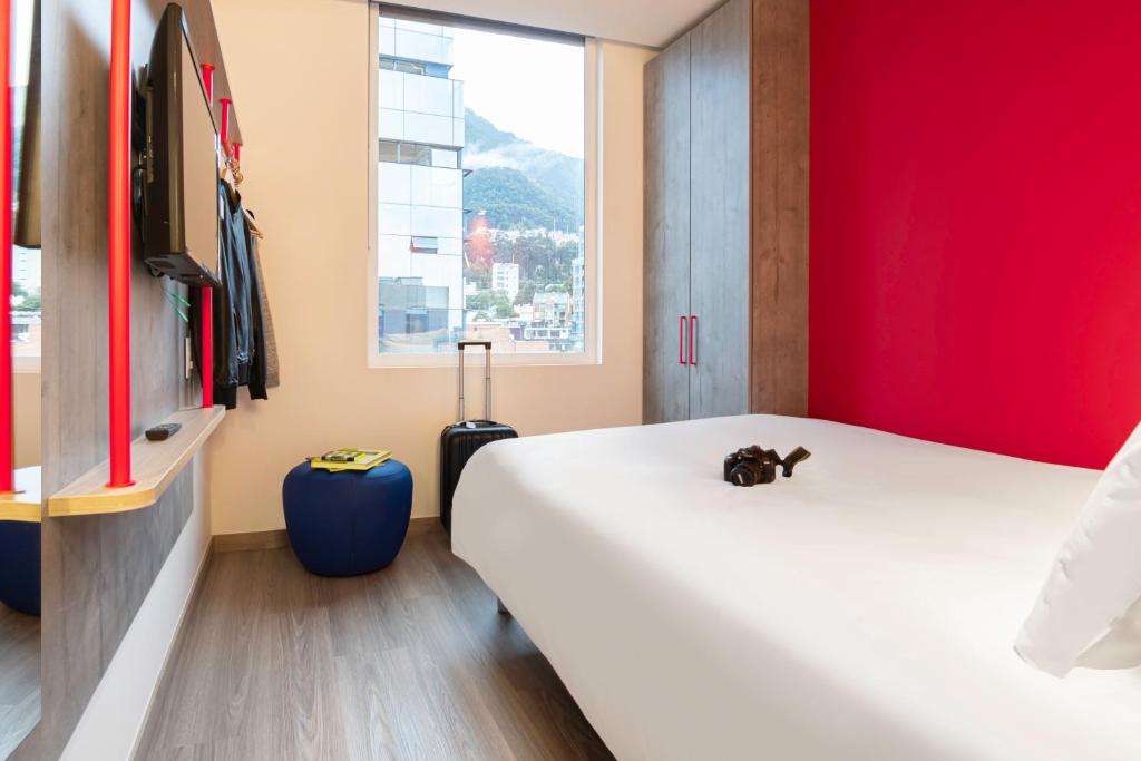 Postel nebo postele na pokoji v ubytování ibis budget Bogota Marly