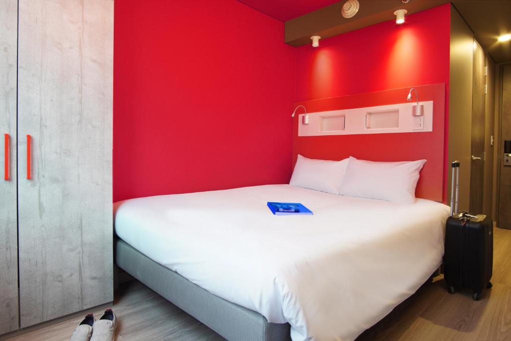 Postel nebo postele na pokoji v ubytování ibis budget Bogota Marly