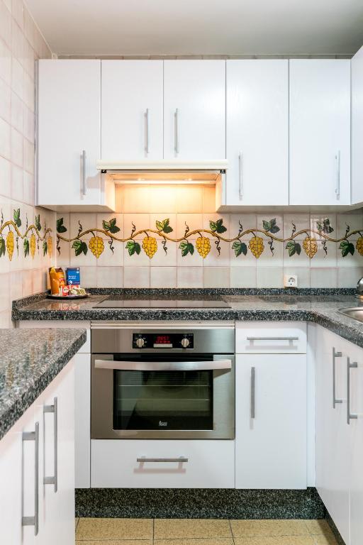 Kuchyň nebo kuchyňský kout v ubytování Holi-Rent Estrella