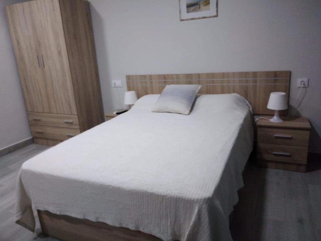 Postel nebo postele na pokoji v ubytování Casa Inocencio