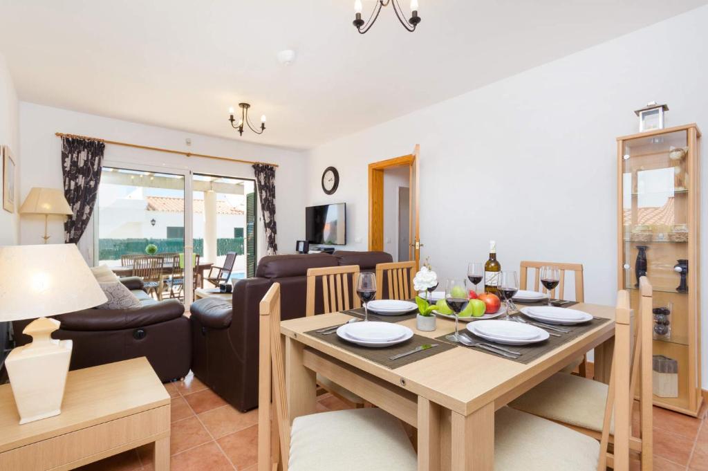 A seating area at Villa Leander by Villa Plus