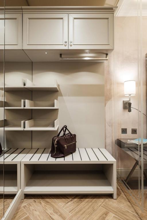 Postel nebo postele na pokoji v ubytování Hotel Pjazza Merkanti - Boutique Living