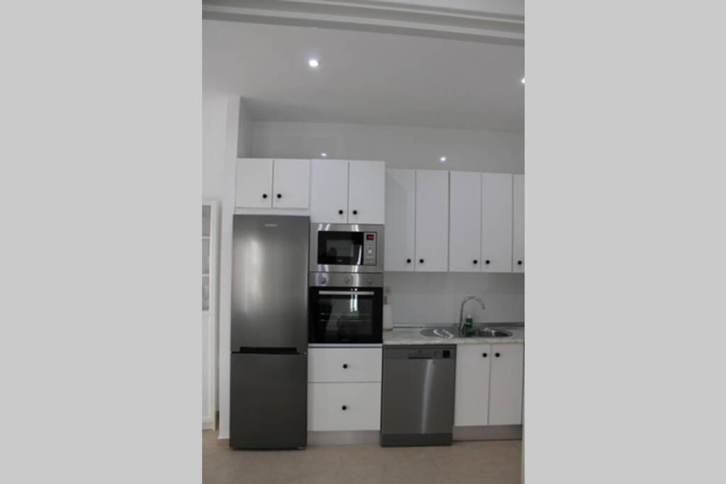 Kuchyň nebo kuchyňský kout v ubytování Apartamento centro Lorenzo Borrego