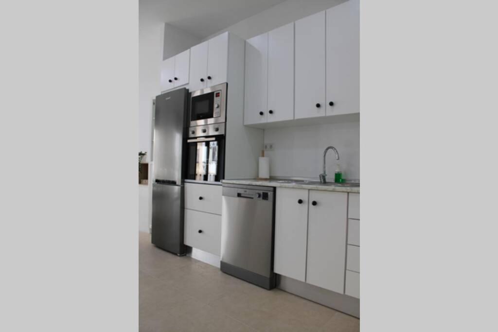 Kuchyň nebo kuchyňský kout v ubytování Apartamento centro Lorenzo Borrego