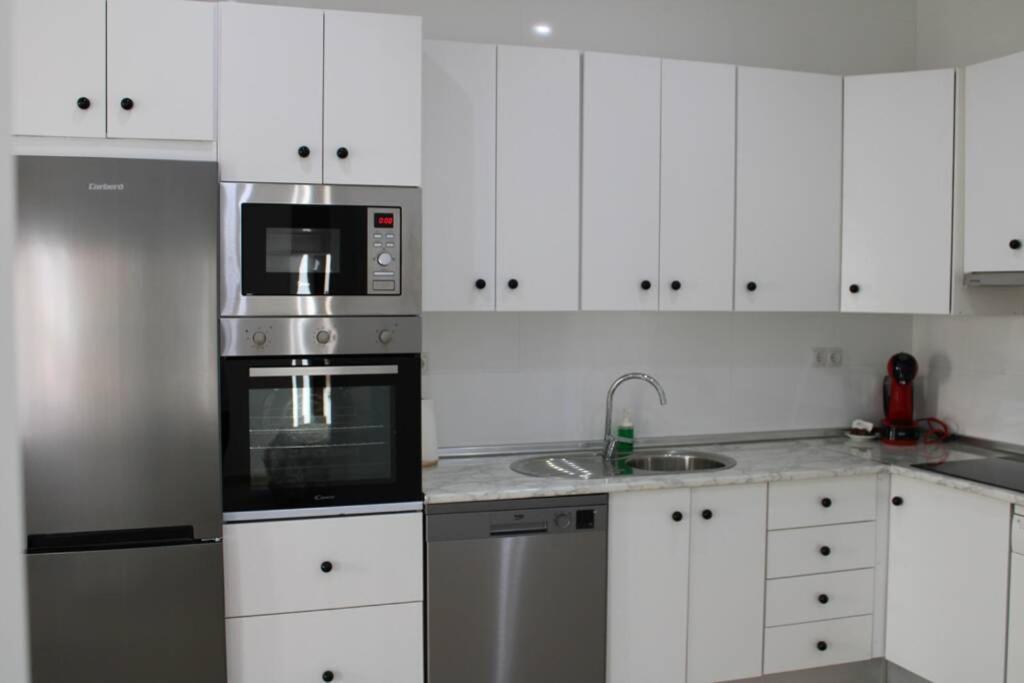 Kuchyň nebo kuchyňský kout v ubytování Apartamento centro Lorenzo Borrego