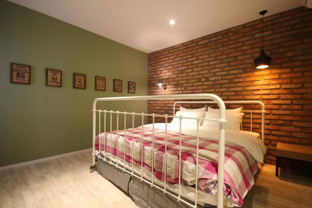 Postel nebo postele na pokoji v ubytování Hotel 25 Seomyeon