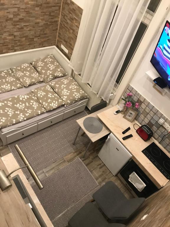 Posteľ alebo postele v izbe v ubytovaní Móra apartmanház