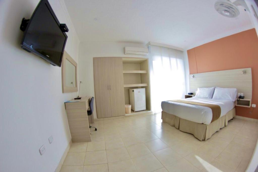 Postel nebo postele na pokoji v ubytování Vajamar Hotel