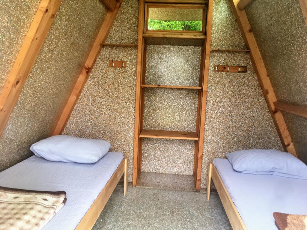 Voodi või voodid majutusasutuse Camping Oaza toas