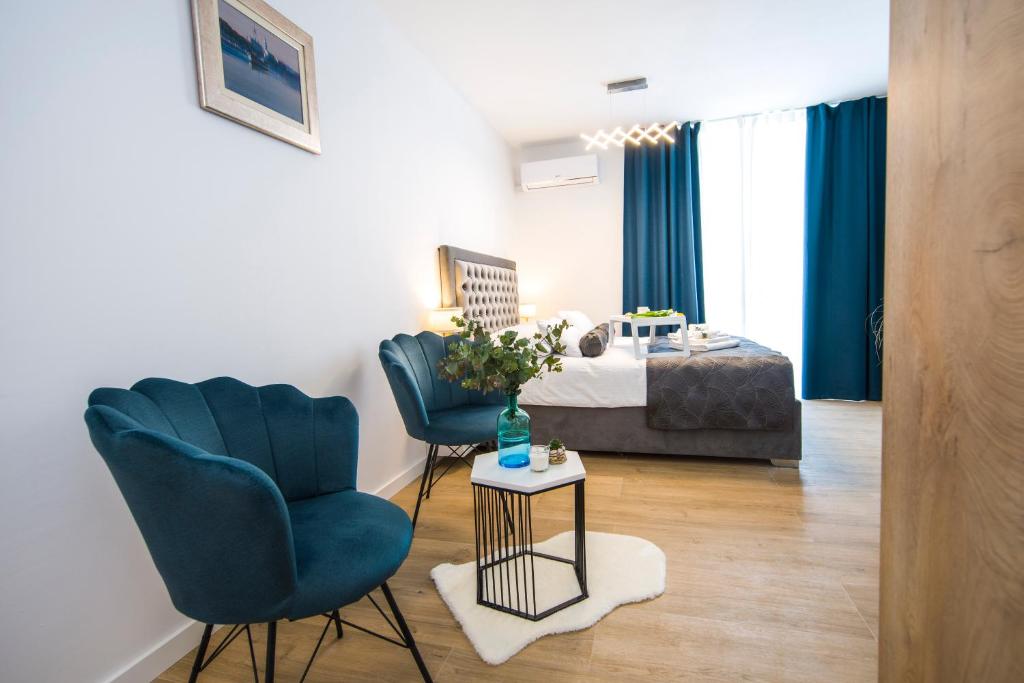 Posteľ alebo postele v izbe v ubytovaní RC Apartment