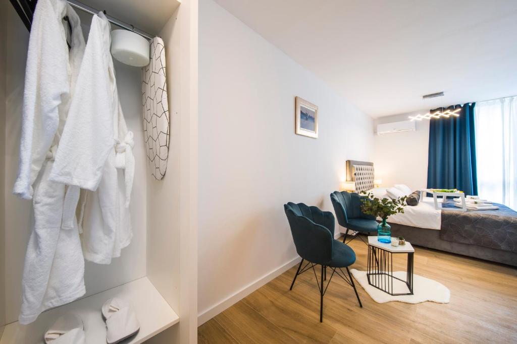 Posteľ alebo postele v izbe v ubytovaní RC Apartment