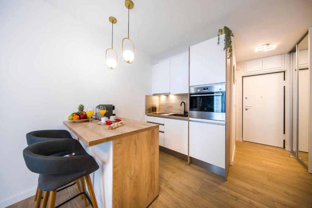 Kuchyňa alebo kuchynka v ubytovaní RC Apartment