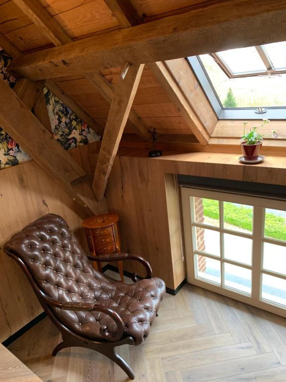 Posezení v ubytování B&B De Rentmeesterhoeve