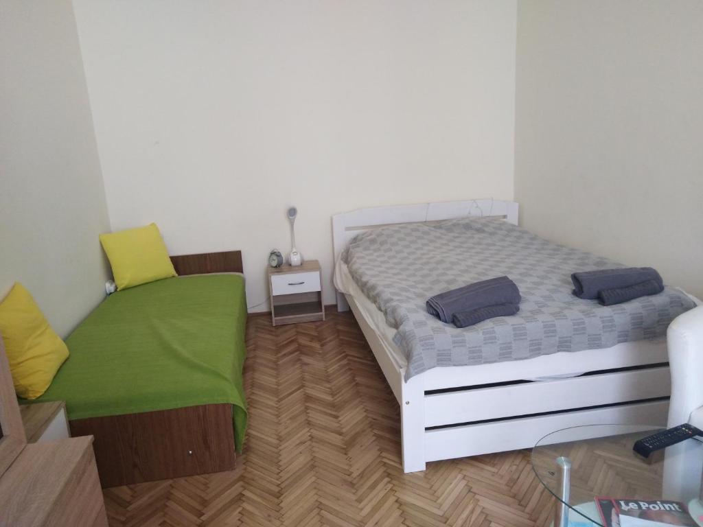 Posteľ alebo postele v izbe v ubytovaní Adrienn apartment