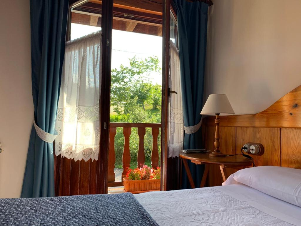 Postel nebo postele na pokoji v ubytování Agroturismo Urresti