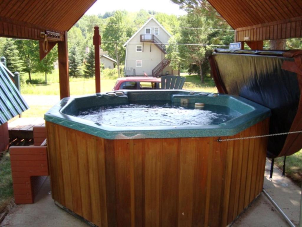 a hot tub in the backyard of a house at Mittenwald in Bessemer