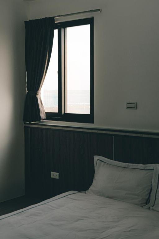 Postel nebo postele na pokoji v ubytování Destination Inn