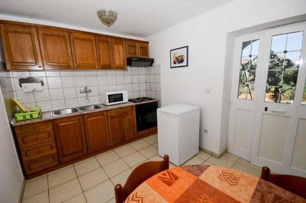 Kuchyň nebo kuchyňský kout v ubytování House Marija