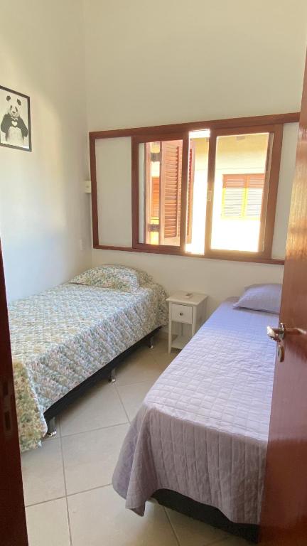  Casa em condomínio próximo ao centrinho e a praia.