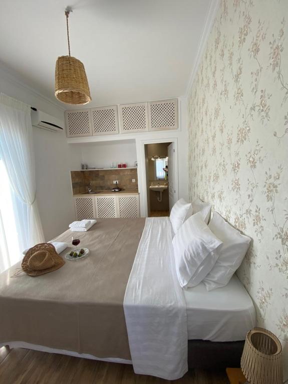 Łóżko lub łóżka w pokoju w obiekcie Reginas Apartments