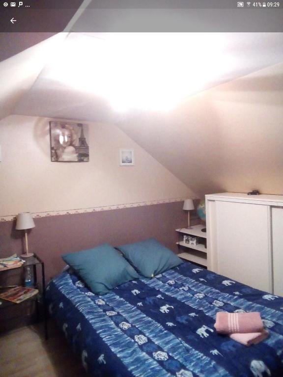 Postel nebo postele na pokoji v ubytování les vignes d'Ygrande