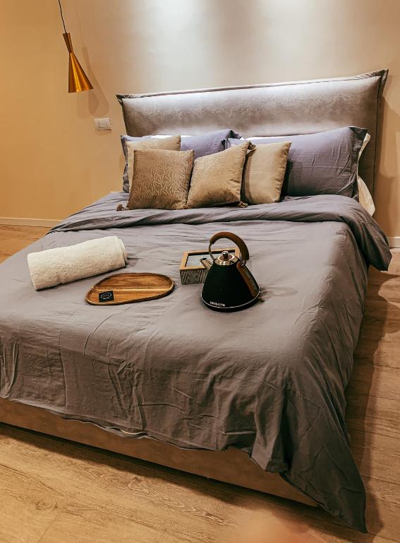 Posteľ alebo postele v izbe v ubytovaní B&B SALUS CIVICO 23