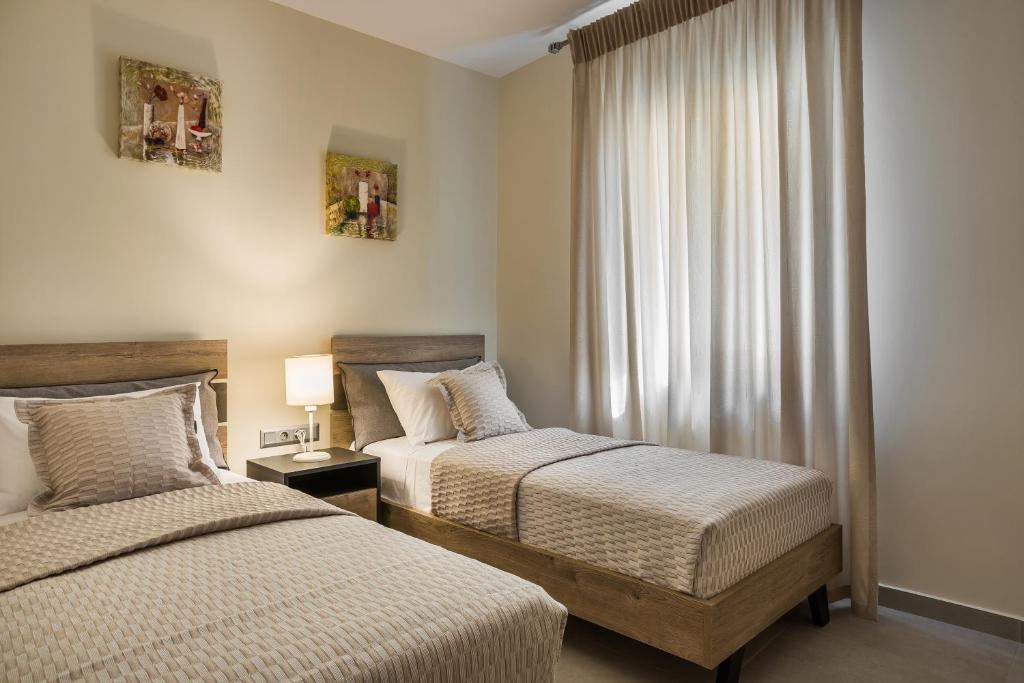 A bed or beds in a room at Serenity Home