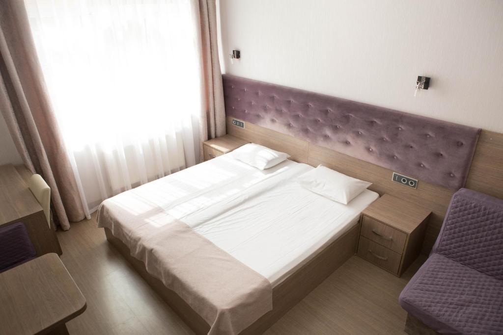 Postel nebo postele na pokoji v ubytování Mini ELEGANT