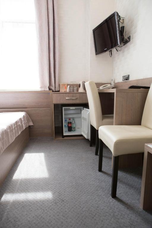 TV a/nebo společenská místnost v ubytování Mini ELEGANT