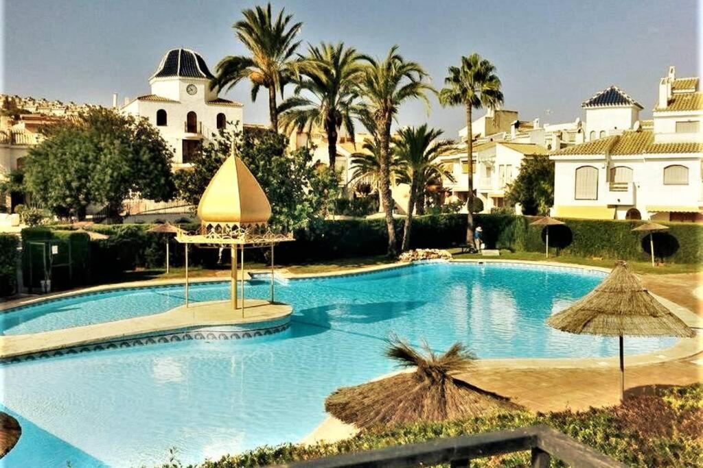 The swimming pool at or close to Townhouse with bbq and pools - Costa Hispania