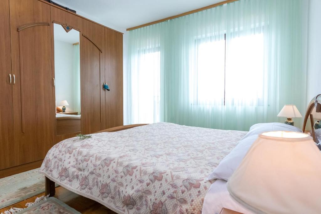 A bed or beds in a room at Pansion Alen - Dugi otok