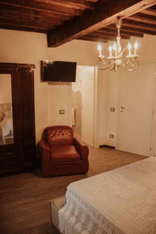 Postel nebo postele na pokoji v ubytování Fonte alle Ninfe B&B