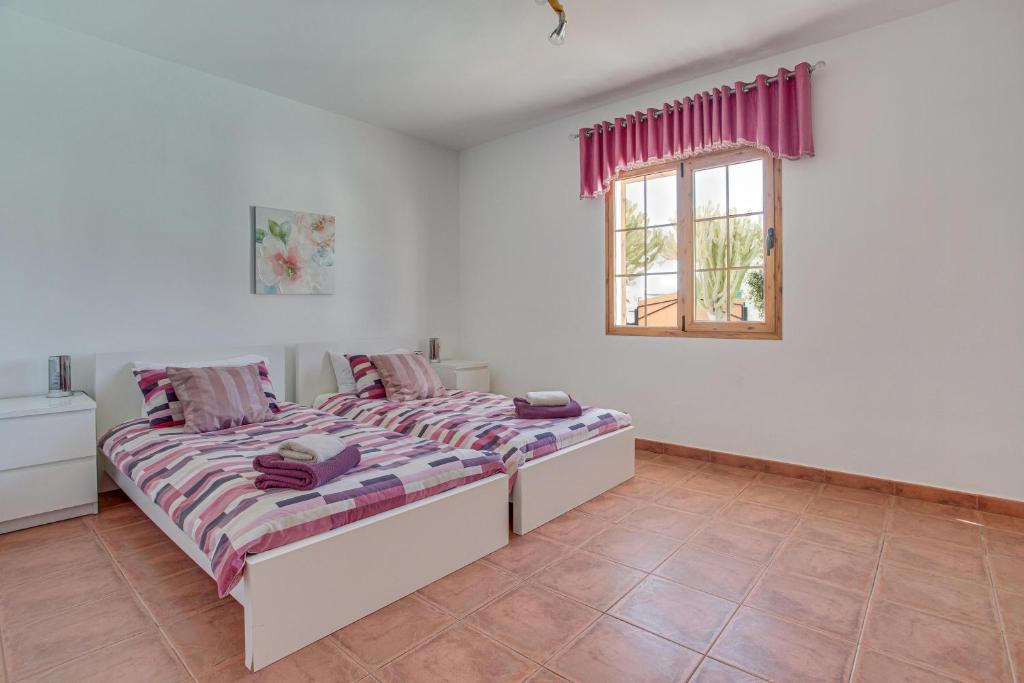 Postel nebo postele na pokoji v ubytování Villa Lea