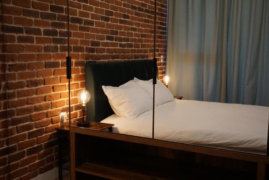 Cama ou camas em um quarto em Onix Blue
