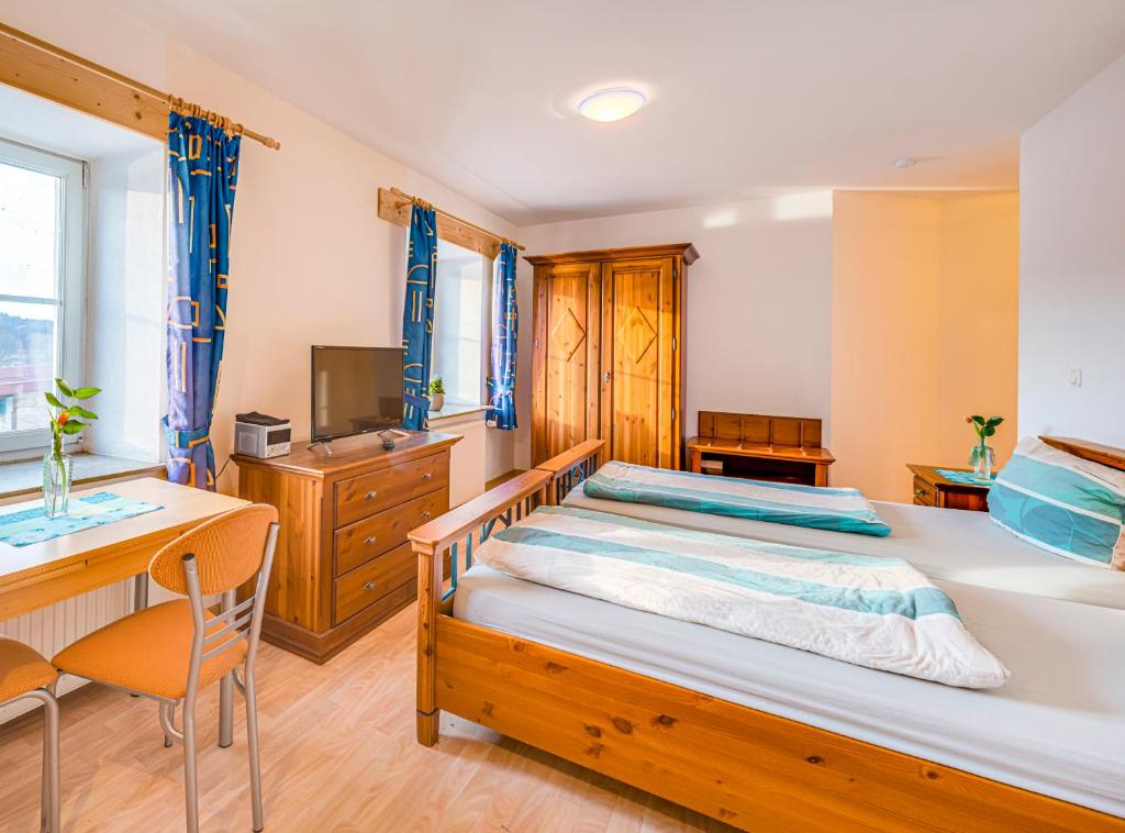Postel nebo postele na pokoji v ubytování Sankt Georgimühle