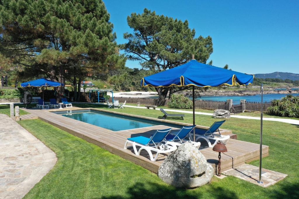Πισίνα στο ή κοντά στο Casa Porto Cabanas by Upper Luxury Housing