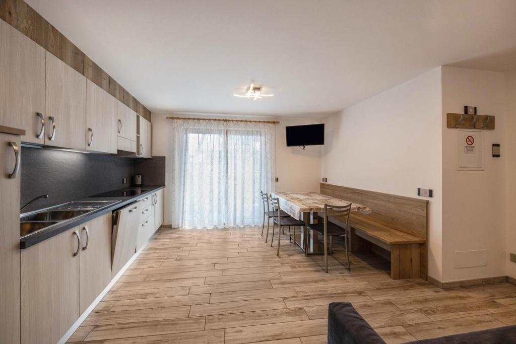Kuchyň nebo kuchyňský kout v ubytování casa vacanze arcobaleno