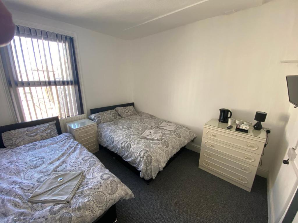 
Triple Room with Private Bathroom
