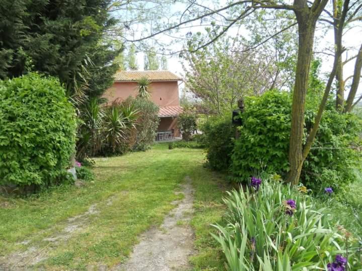 A garden outside Il Casale di Aquarubra
