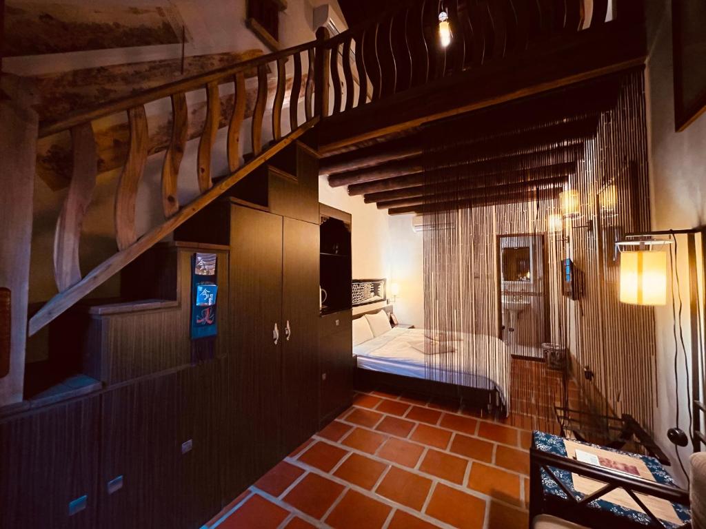 Postel nebo postele na pokoji v ubytování Grace Kinmen B&B