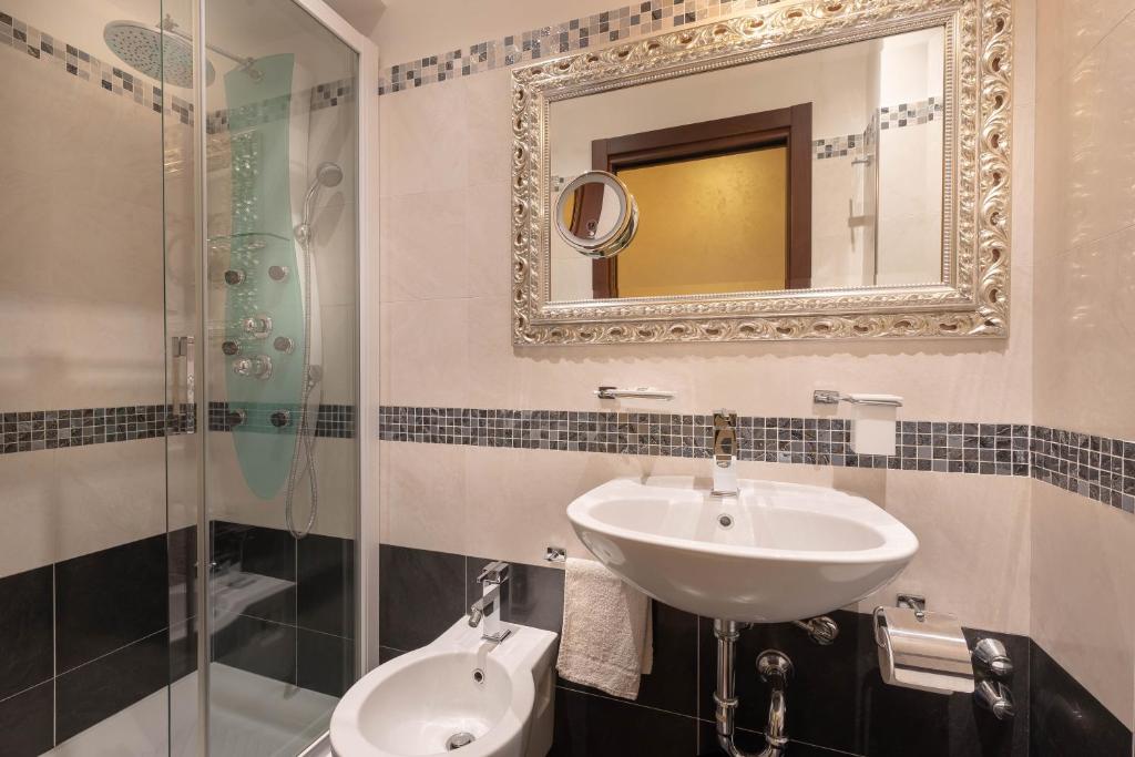 Koupelna v ubytování Hotel Petronio