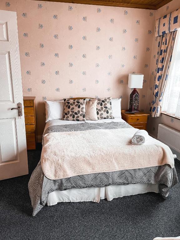 Postel nebo postele na pokoji v ubytování St Anthonys B&B